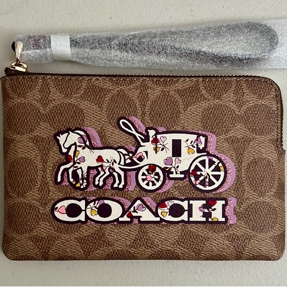 Coach Wristlet with Horse and Carriage Motif - Picture 1 of 2